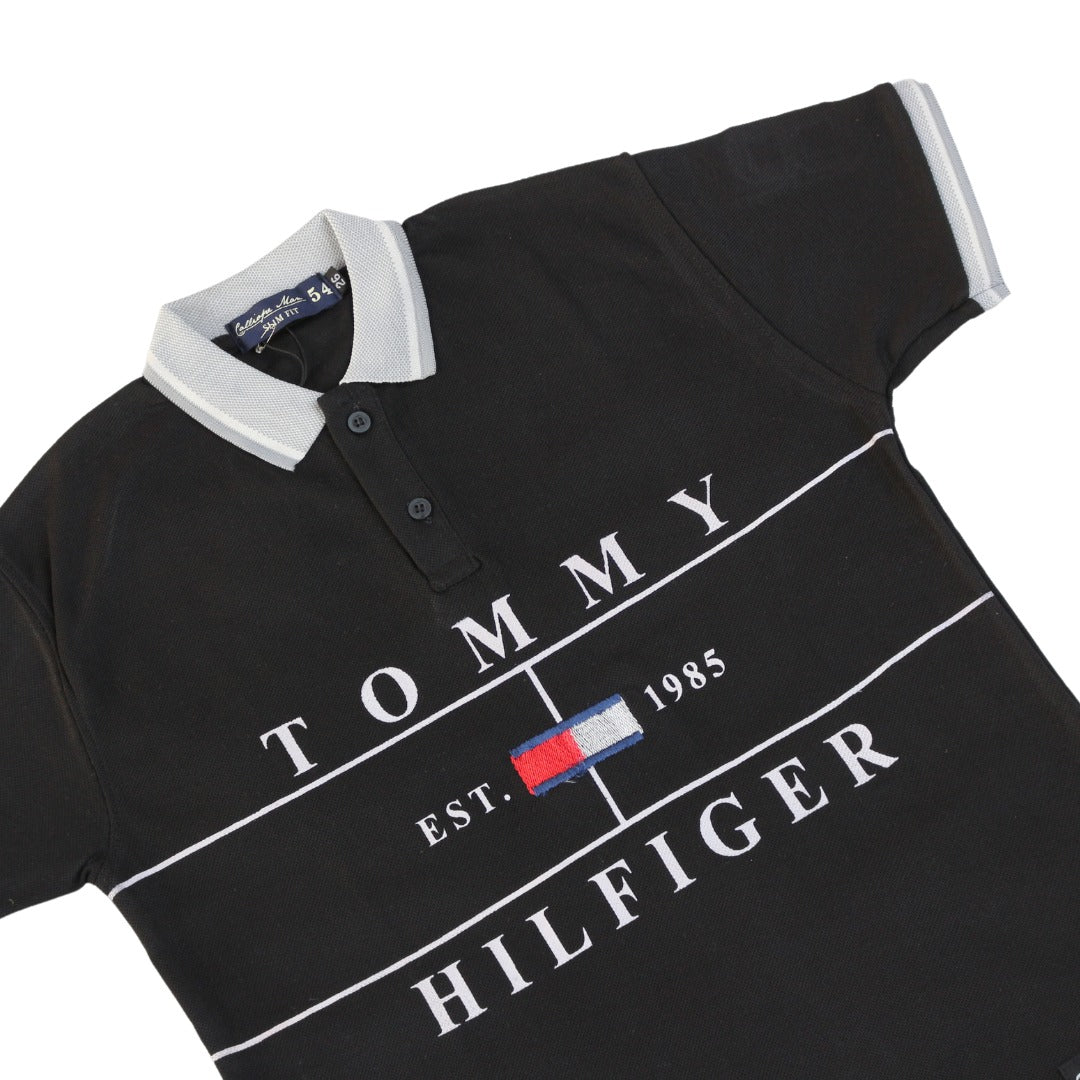 Boys black Tommy Hilfiger polo shirt